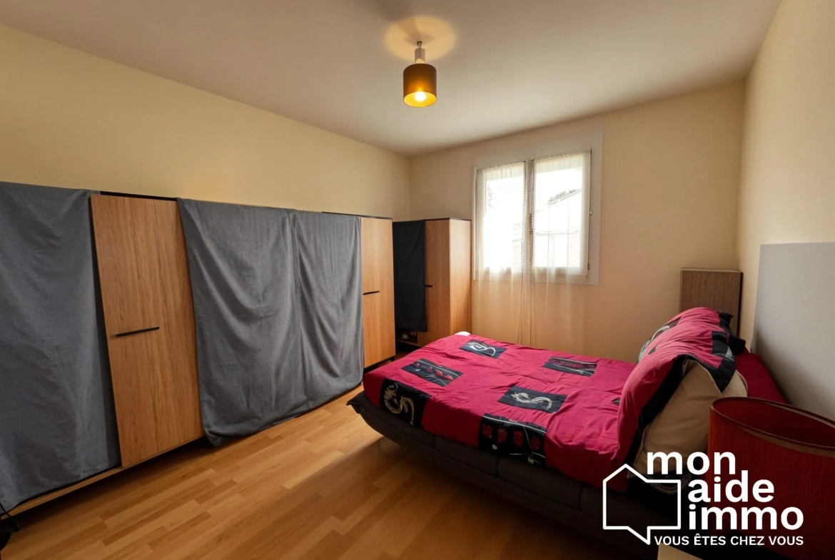 Maison de plain-pied à vendre à Coutras avec grand garage et jardin 