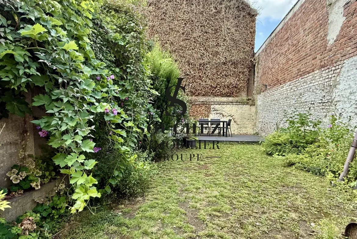 Maison ancienne centre-ville de Lens avec 3 chambres, garage et jardin 
