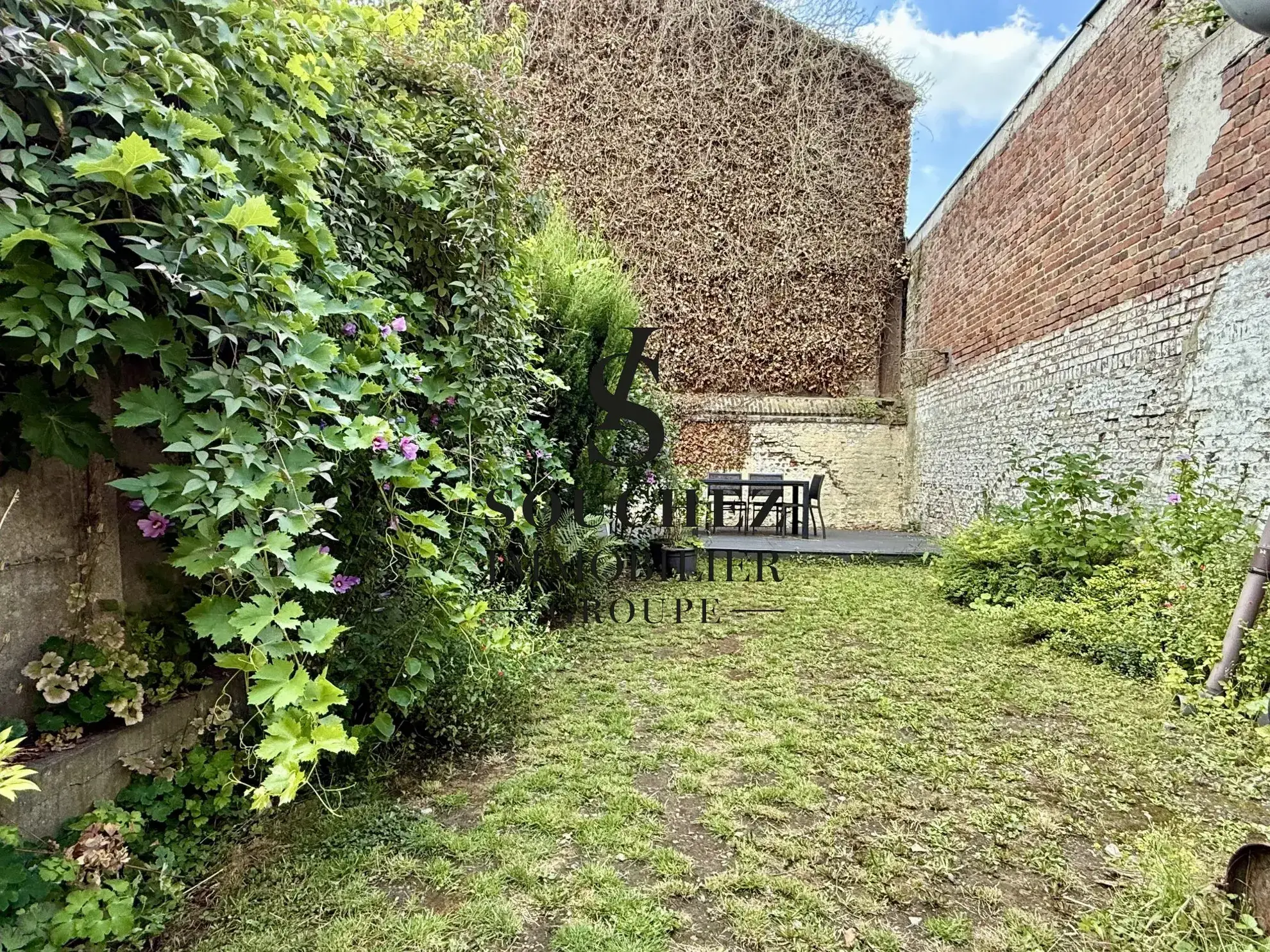 Maison ancienne centre-ville de Lens avec 3 chambres, garage et jardin 