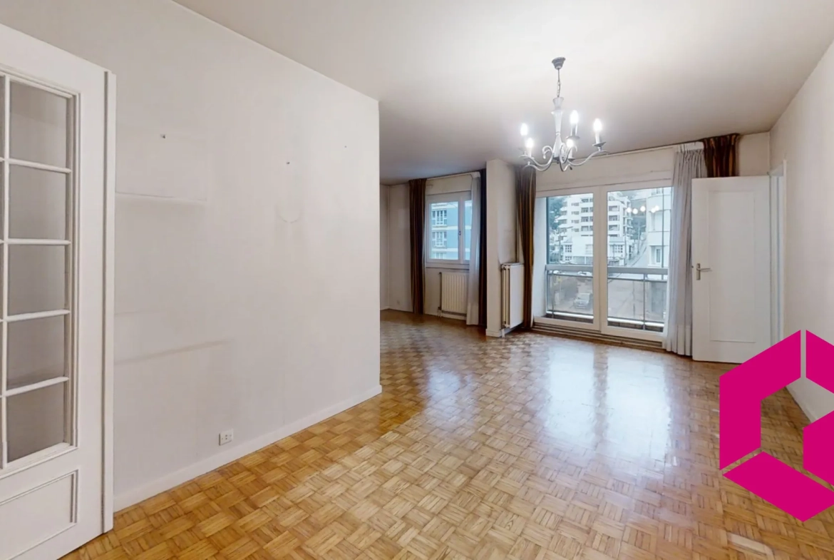Appartement T4 avec balcon, garage à Saint-Étienne – Idéal pour famille et investisseurs 