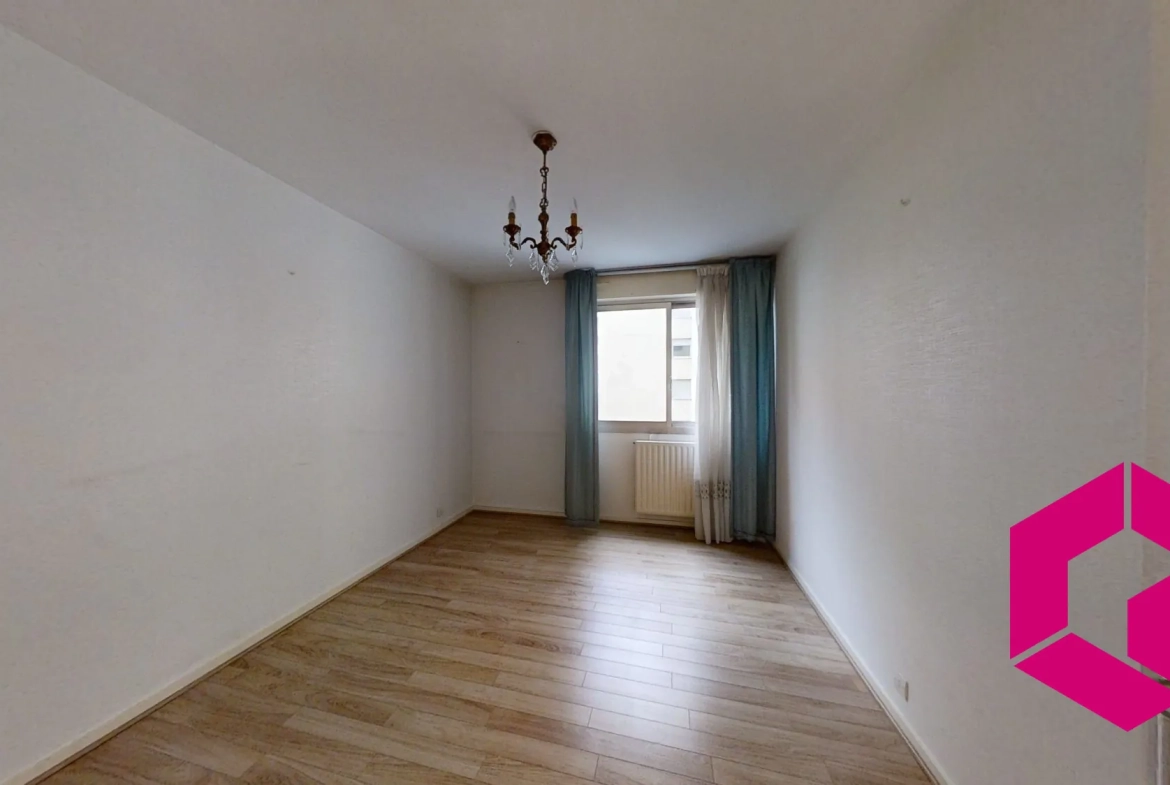 Appartement T4 avec balcon, garage à Saint-Étienne – Idéal pour famille et investisseurs 