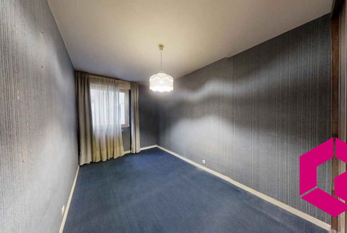 Appartement T4 avec balcon, garage à Saint-Étienne – Idéal pour famille et investisseurs 