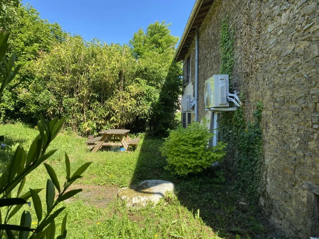 Maison en pierre rénovée avec garage et potentiel à Masléon, Limoges à vendre 
