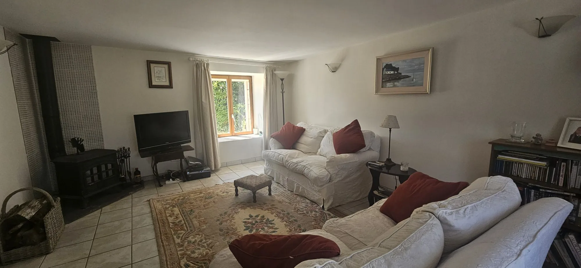 Maison 1 - salon Ensemble immobilier de deux maisons bretonnes avec terrain et potentiel d'investissement 
