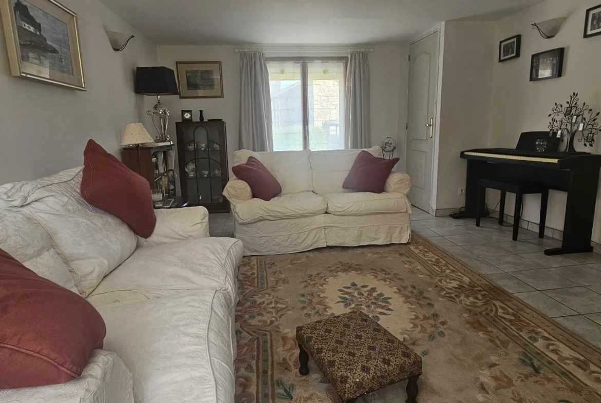 Maison 1 - salon Ensemble immobilier de deux maisons bretonnes avec terrain et potentiel d'investissement 
