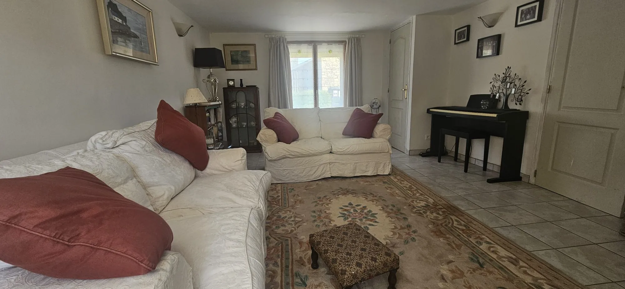 Maison 1 - salon Ensemble immobilier de deux maisons bretonnes avec terrain et potentiel d'investissement 