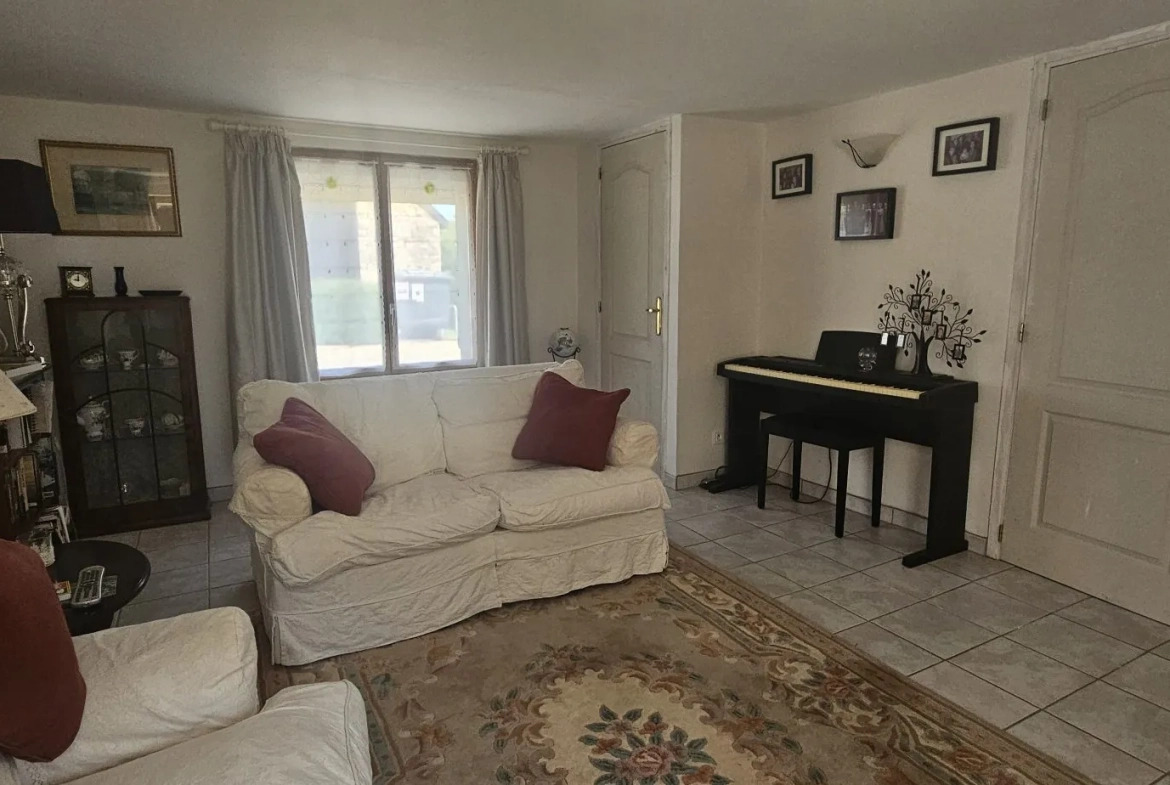 Maison 1 - salon Ensemble immobilier de deux maisons bretonnes avec terrain et potentiel d'investissement 