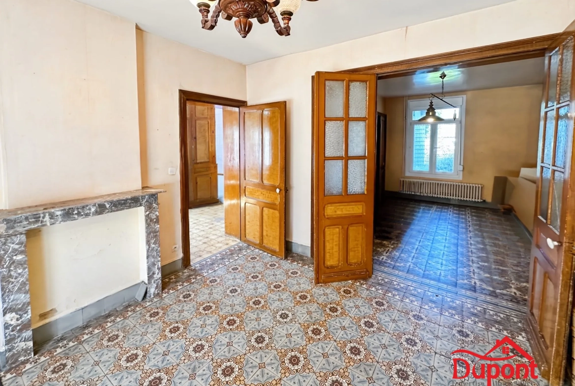 Maison semi-individuelle avec jardin, garage à Aulnoy Amérie - Opportunité familiale 