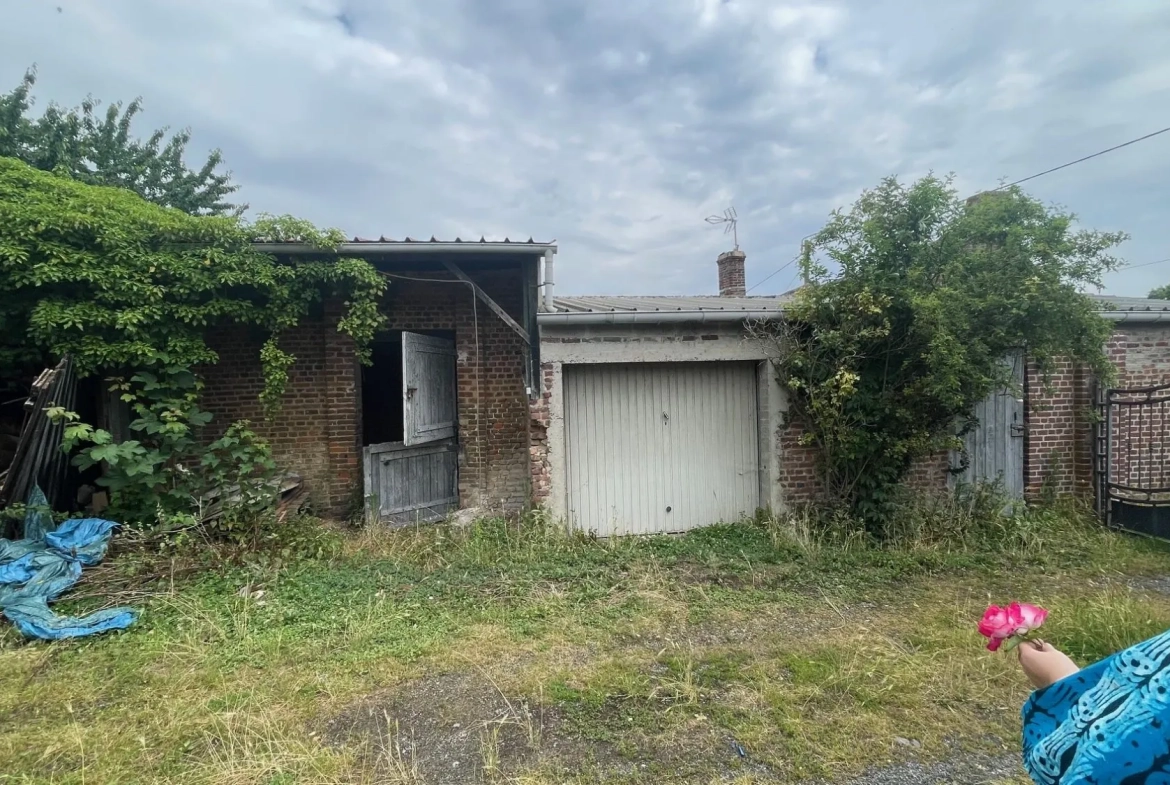 Maison à vendre avec partie commerciale et habitation à Voyennes 