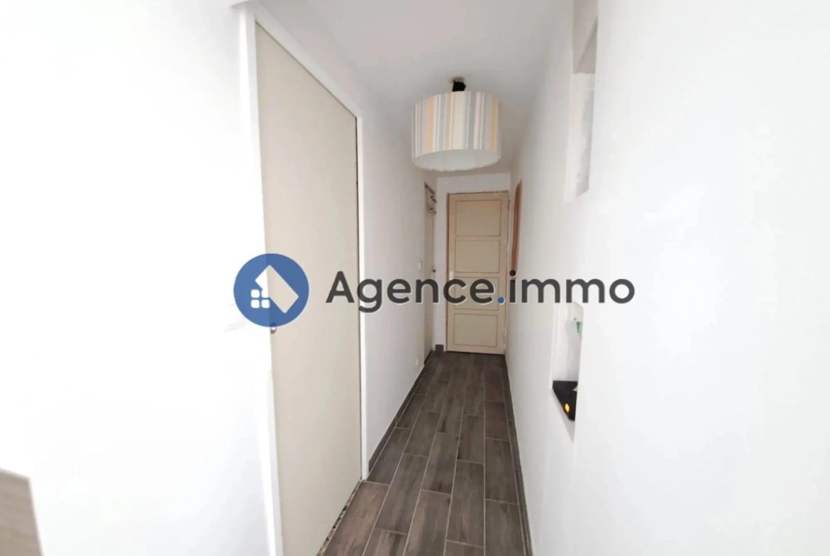 Maison de bourg rénovée à Changé avec jardin et garage - Opportunité à saisir 