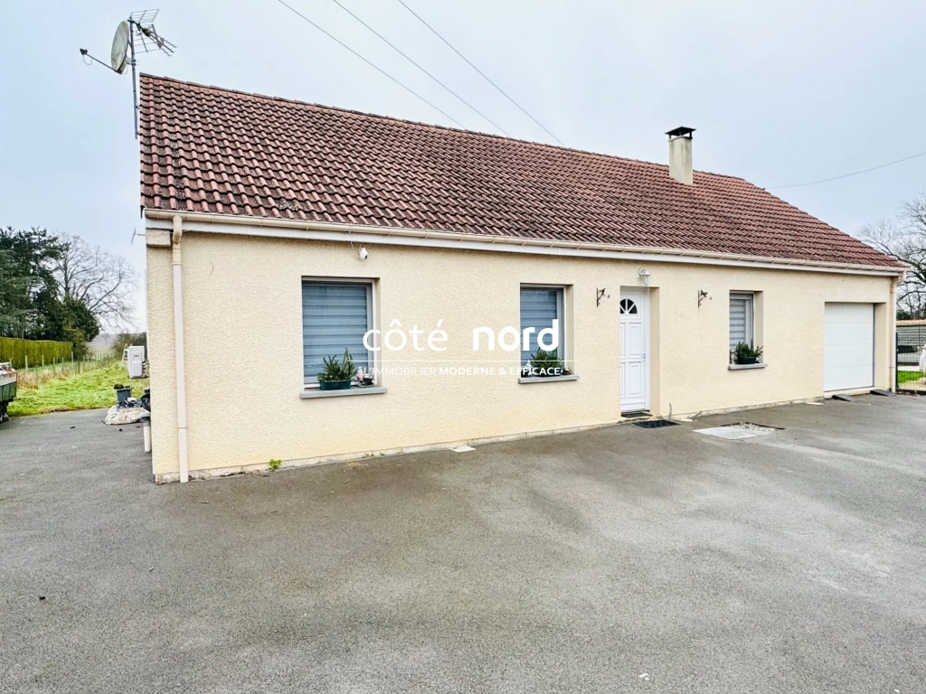 Pavillon individuel de plain-pied proche Caudry avec garage et grande véranda