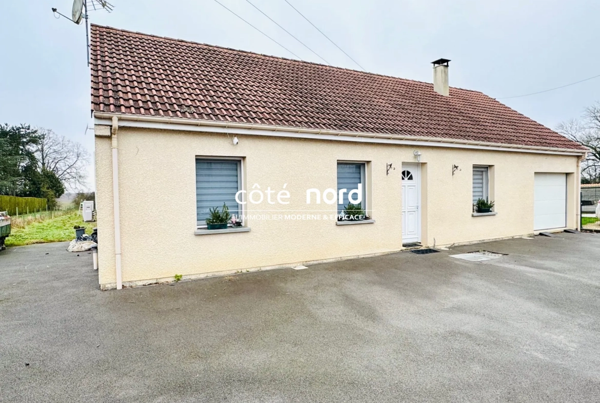 Pavillon individuel de plain-pied proche Caudry avec garage et grande véranda 