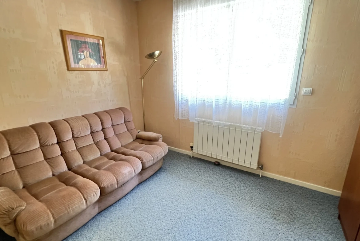 Maison de plain-pied à Boutigny-sur-Essonne avec jardin, terrasse et stationnement 