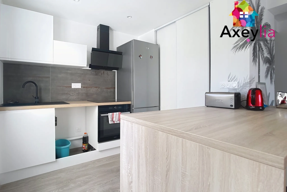 Appartement T4 rénové avec balcon au centre de Roanne 