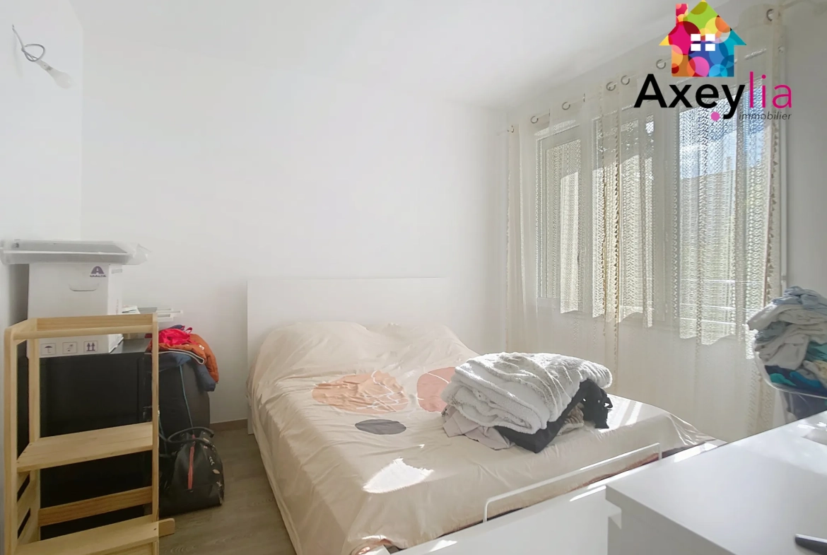 Appartement T4 rénové avec balcon au centre de Roanne 