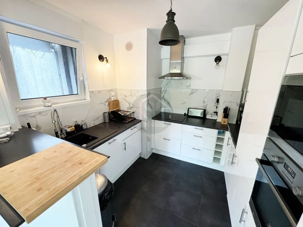 Appartement 2 pièces de 57 m² à Strasbourg face au tramway avec cuisine équipée