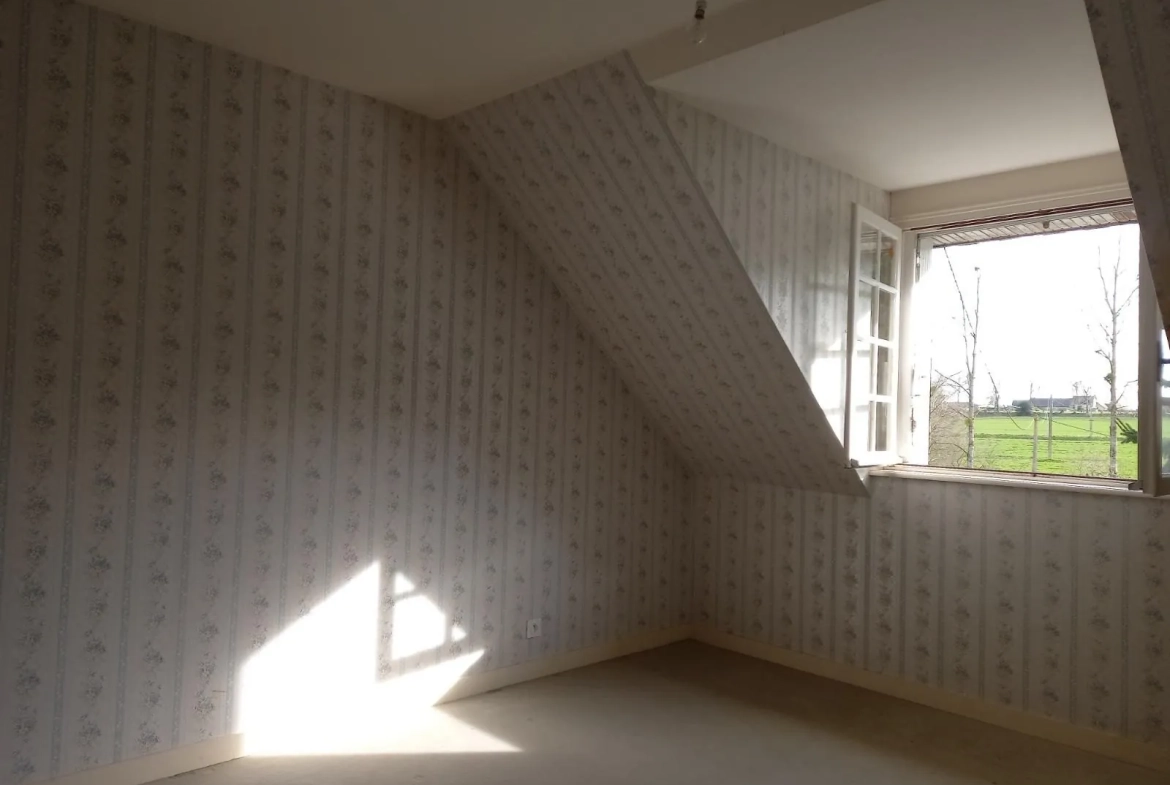 Maison en pierre à Louvigné-du-Désert avec garage et terrain de 1775 m² 
