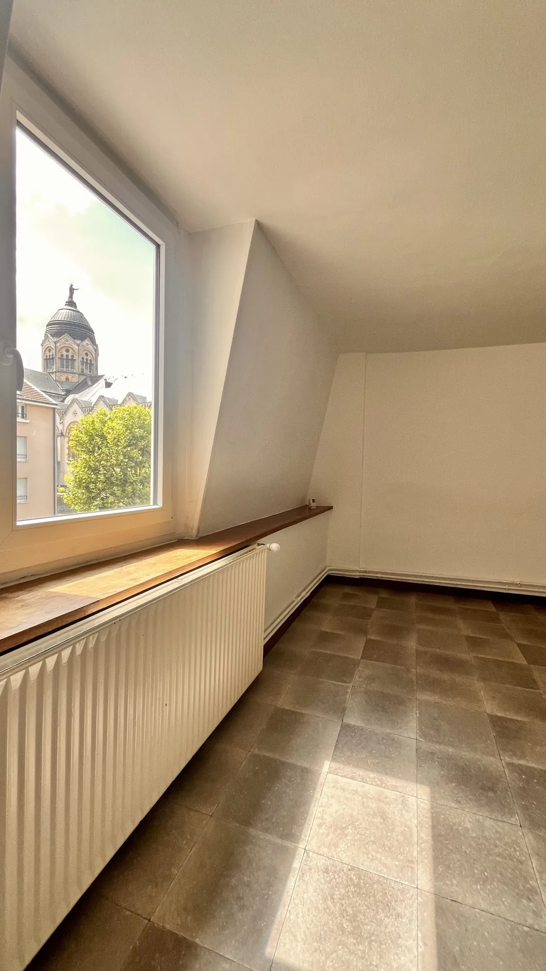 Appartement F2 avec vue sur le Sacré-Cœur à Nancy – Investissement et résidence 