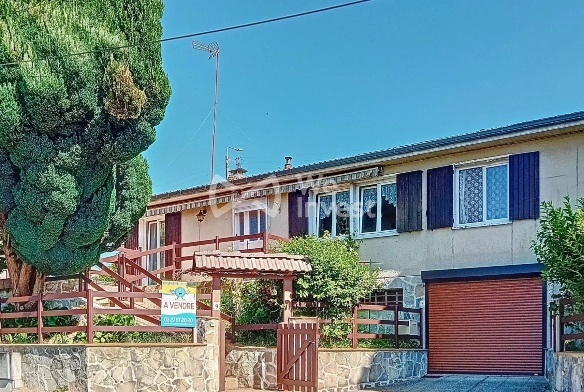 Maison individuelle avec jardin et dépendance à Fourmies 
