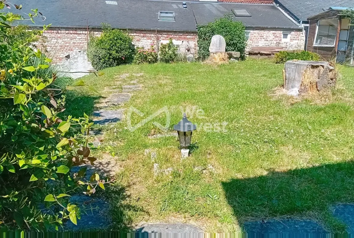 Maison individuelle avec jardin et dépendance à Fourmies 