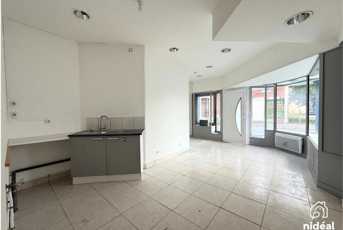 Immeuble de rapport à vendre à Jeumont avec deux lots et jardin 