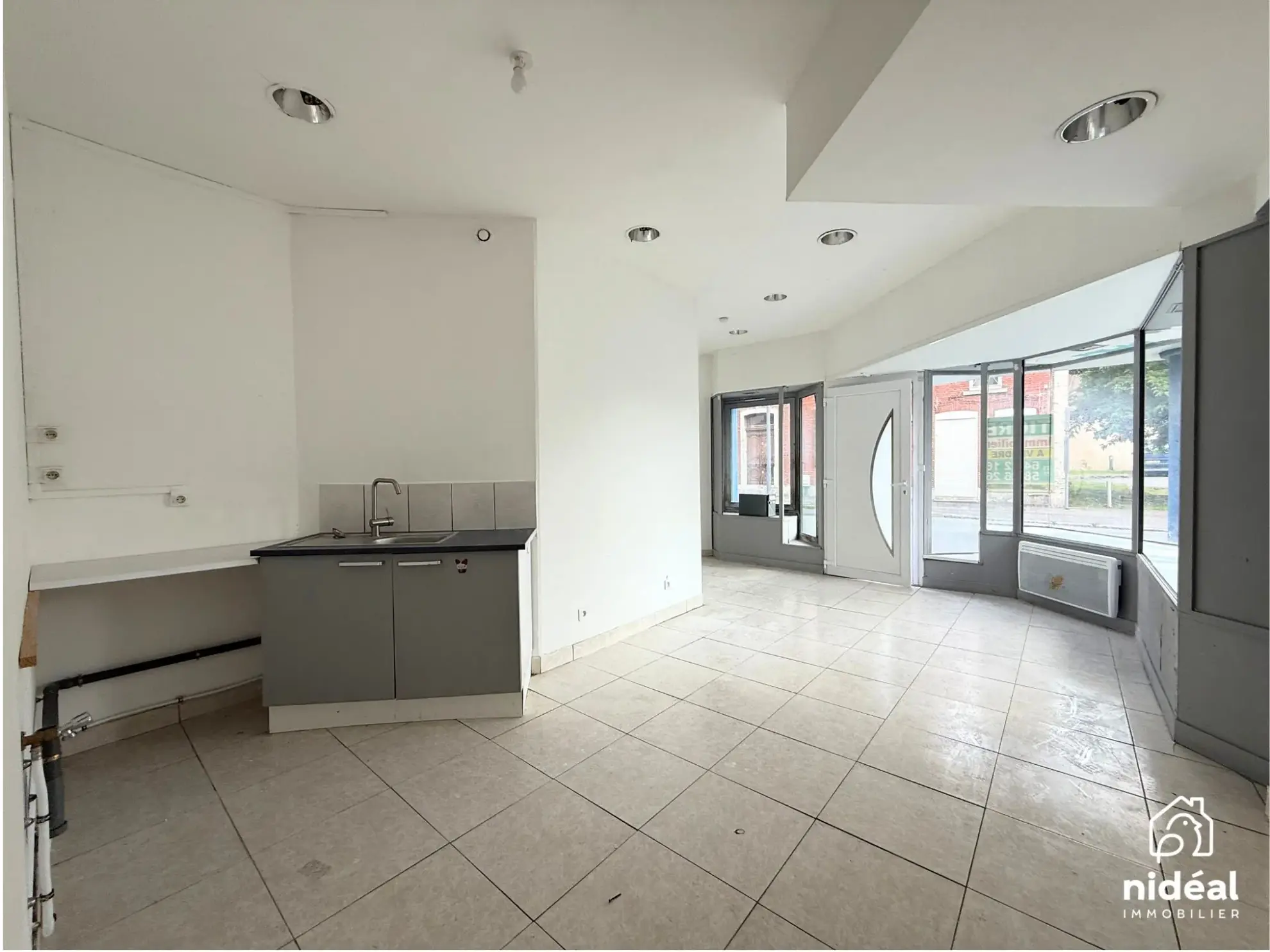 Immeuble de rapport à vendre à Jeumont avec deux lots et jardin 