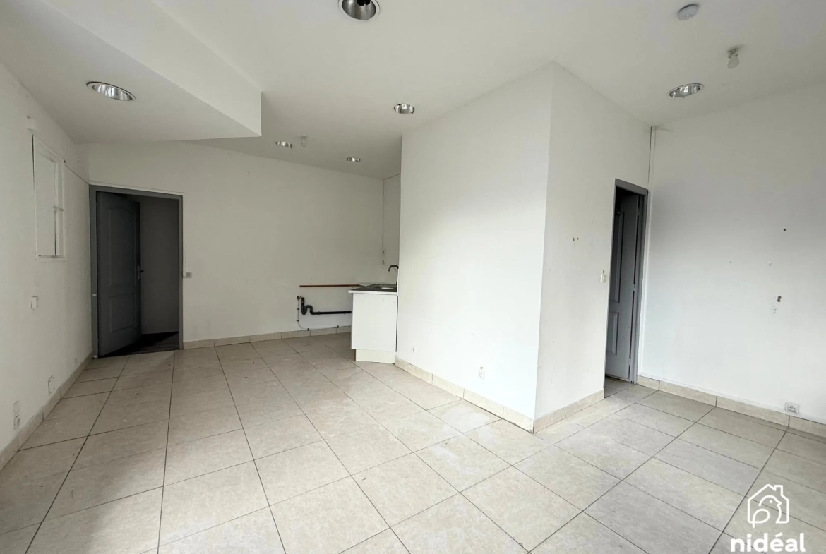 Immeuble de rapport à vendre à Jeumont avec deux lots et jardin 