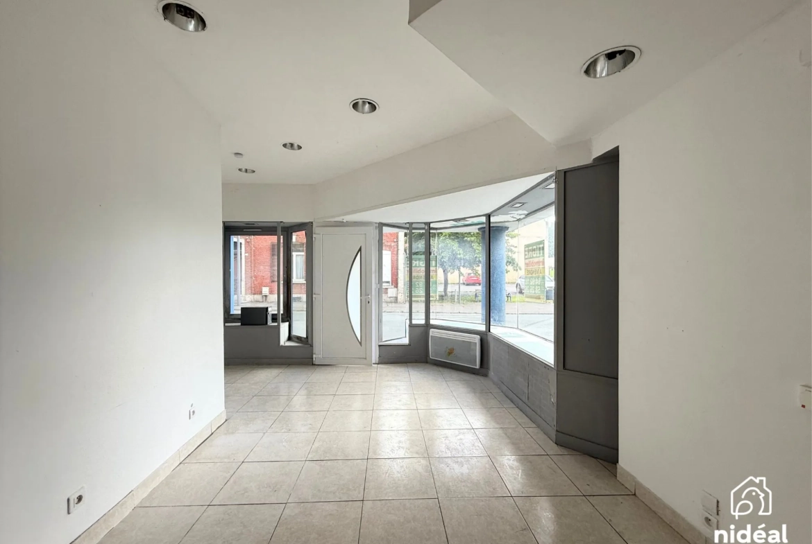 Immeuble de rapport à vendre à Jeumont avec deux lots et jardin 