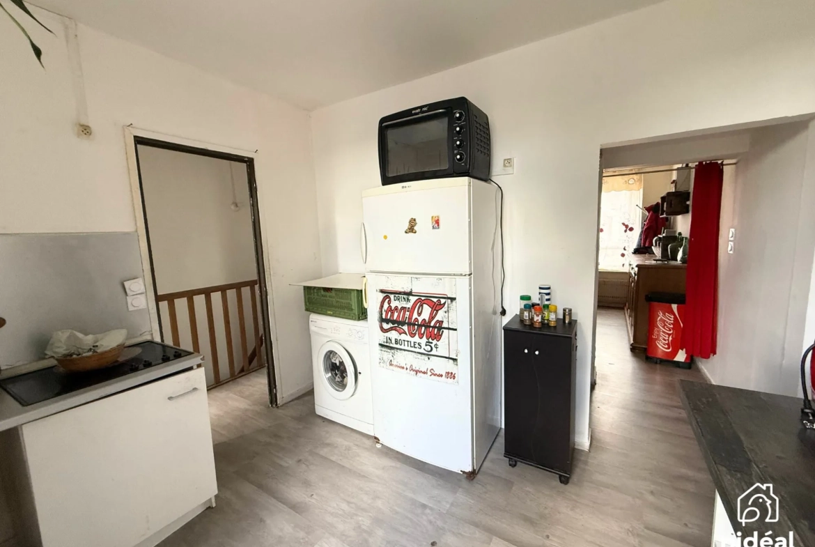 Immeuble de rapport à vendre à Jeumont avec deux lots et jardin 