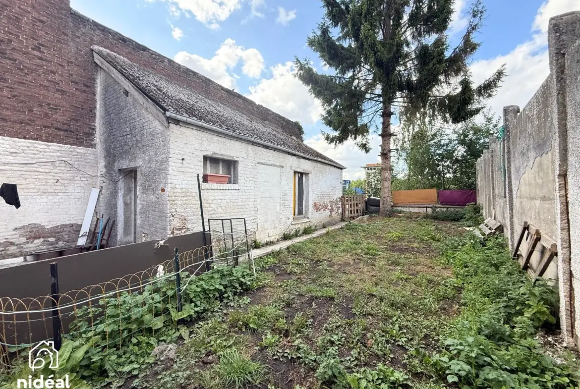 Immeuble de rapport à vendre à Jeumont avec deux lots et jardin 