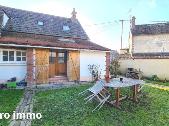 façade arrière Jolie maison avec jardin à Bréval, proche commerces, 3 chambres, terrain clos, idéalement située