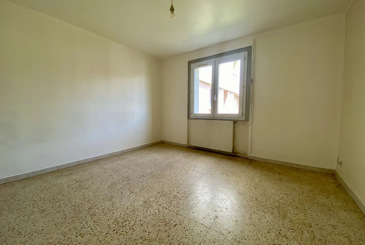 Appartement à vendre à Saint-Uze avec jardin et parking – 63 m² 