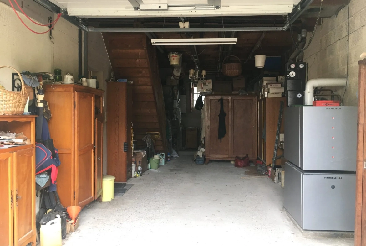 Maison à vendre à Saint-Pierre-de-Bat avec véranda, jardin et garage 
