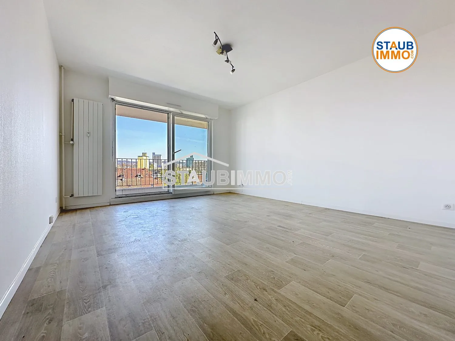 Appartement 3 pièces de 65 m² avec balcon à Huningue, secteur calme et proche Basel 