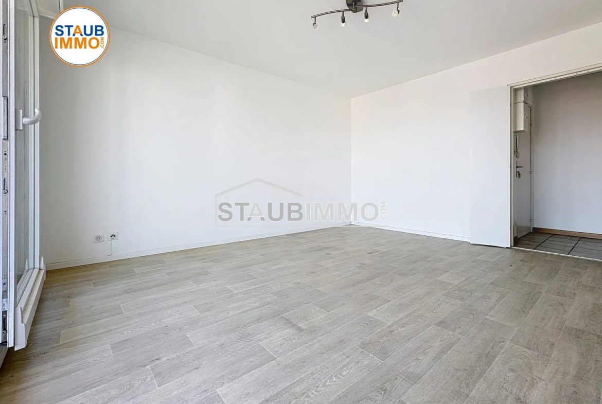 Appartement 3 pièces de 65 m² avec balcon à Huningue, secteur calme et proche Basel 