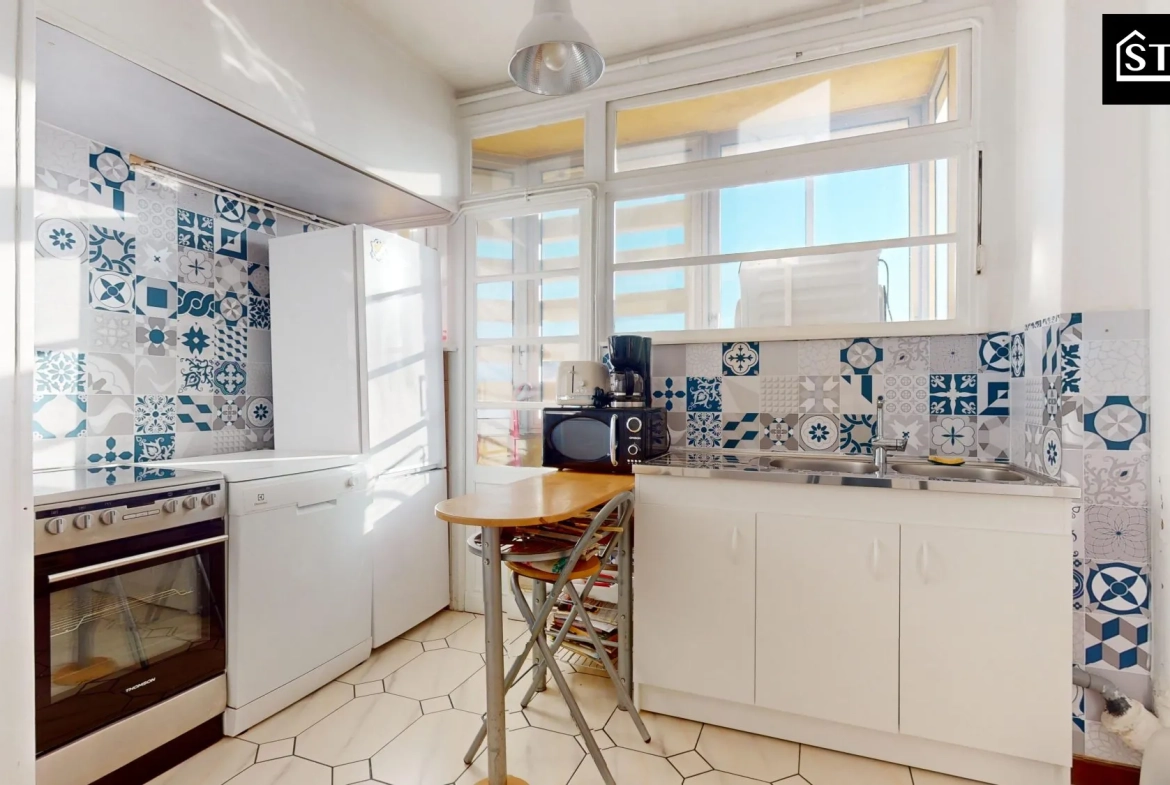 Appartement T4 lumineux avec balcon et cave à Belfort, proximité centre-ville 