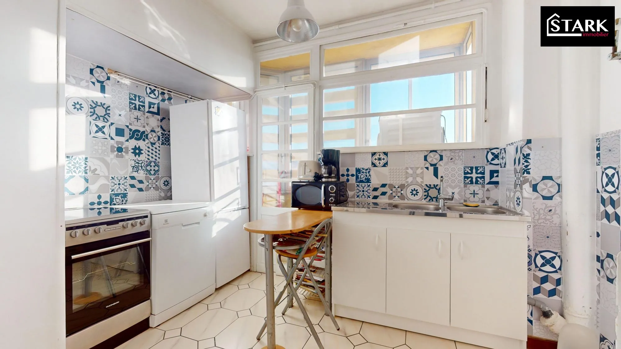 Appartement T4 lumineux avec balcon et cave à Belfort, proximité centre-ville 