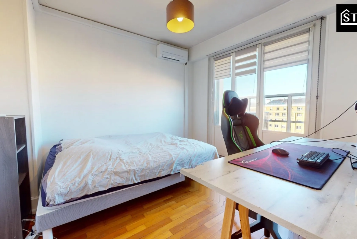 Appartement T4 lumineux avec balcon et cave à Belfort, proximité centre-ville 
