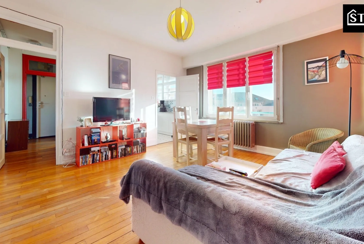 Appartement T4 lumineux avec balcon et cave à Belfort, proximité centre-ville 