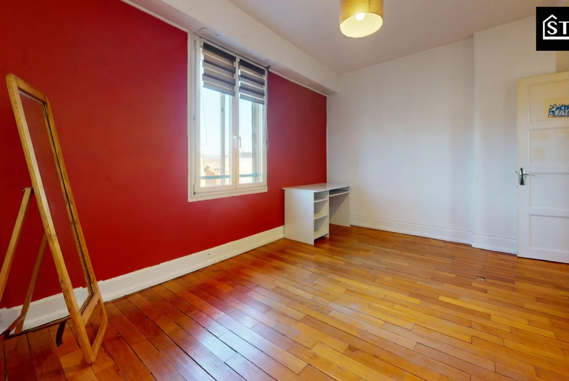 Appartement T4 lumineux avec balcon et cave à Belfort, proximité centre-ville 