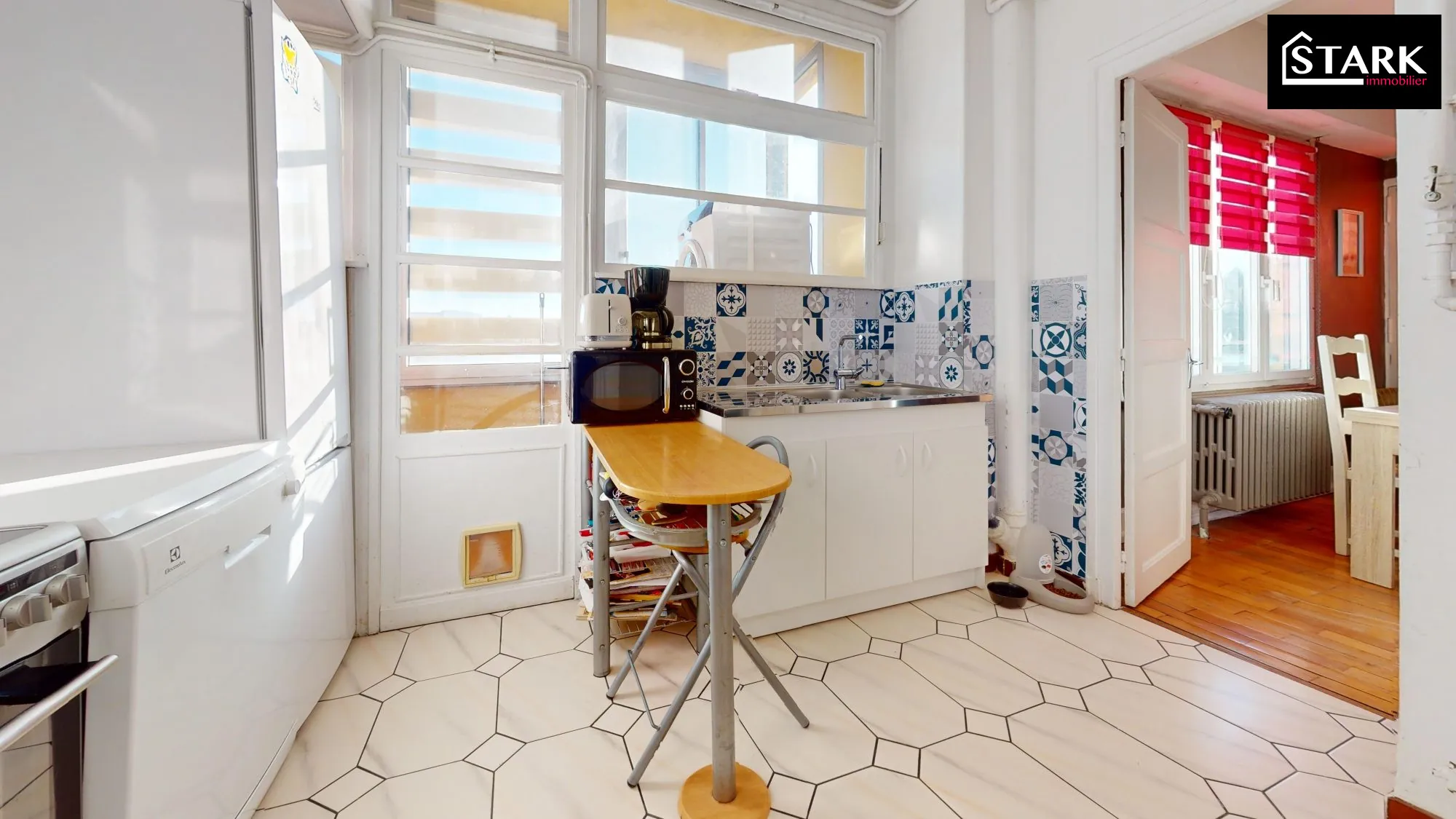 Appartement T4 lumineux avec balcon et cave à Belfort, proximité centre-ville 