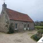 Maison en pierre à rénover à Carneville - 92m² avec dépendance et jardin