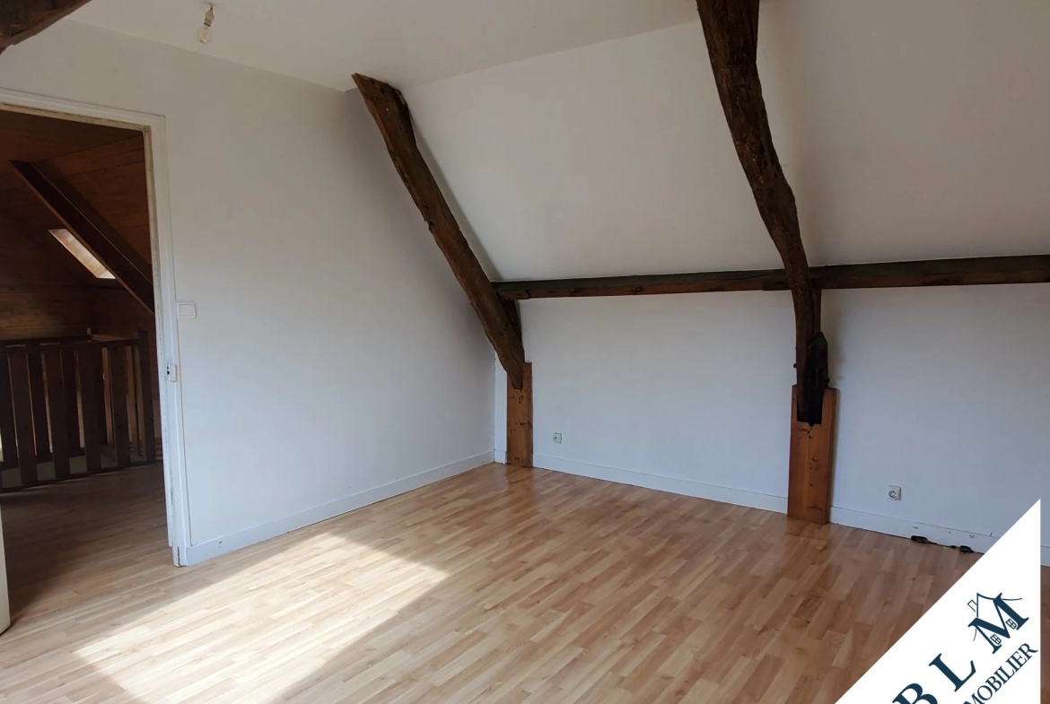 Maison en pierre à rénover à Carneville - 92m² avec dépendance et jardin 