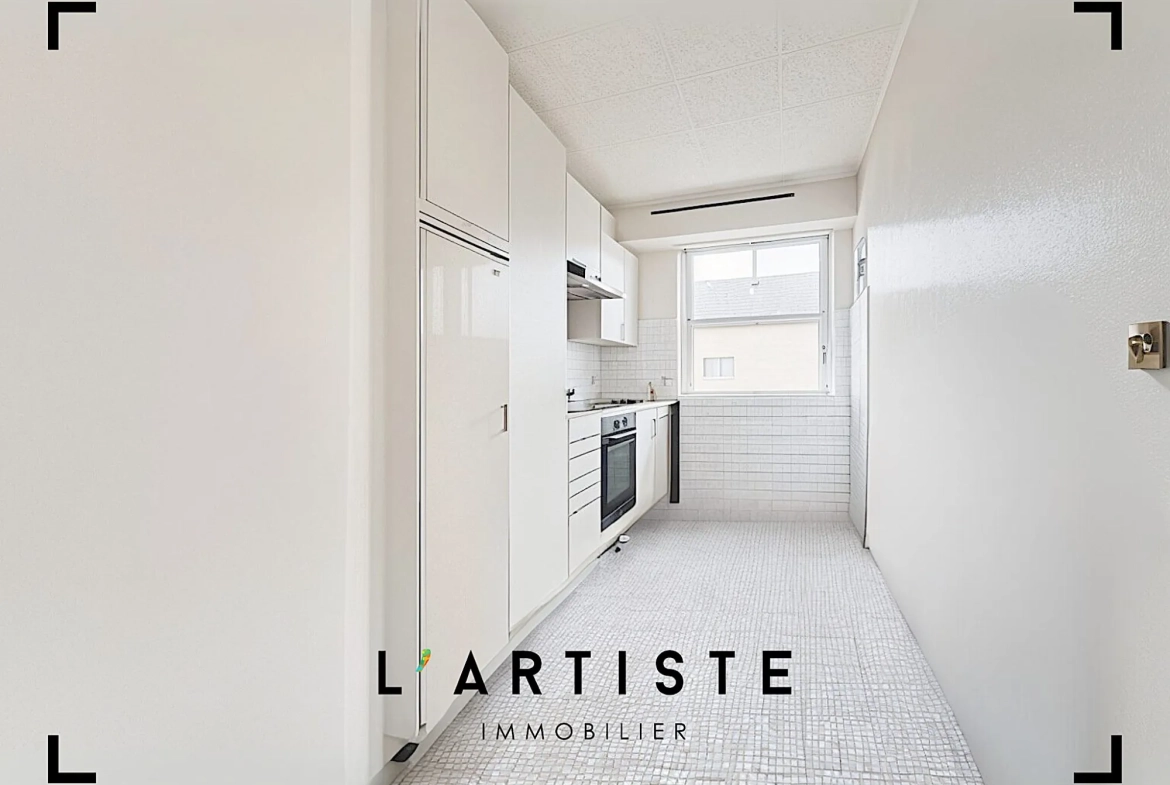 Appartement 3 pièces à vendre au cœur de Rouen avec balcon et vue sur rue 
