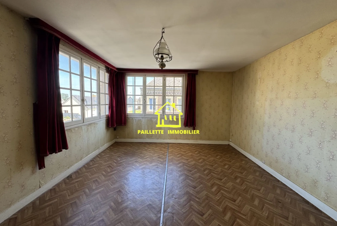 Maison à vendre avec jardin et garage à Gonneville-la-Mallet - Fort potentiel 