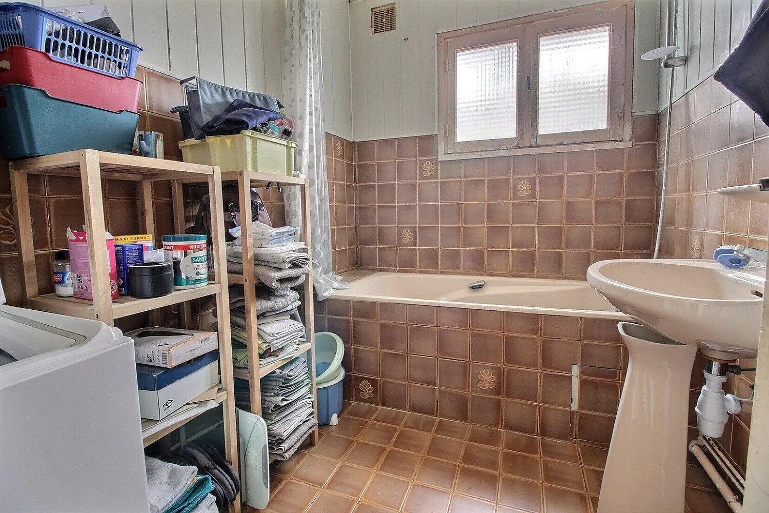 Maison à vendre à Lillers avec jardin, terrasse et potentiel de rénovation 