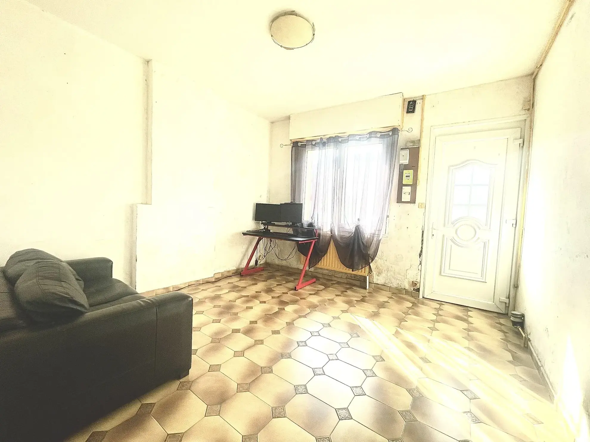 Maison à vendre à Lillers avec jardin, terrasse et potentiel de rénovation 
