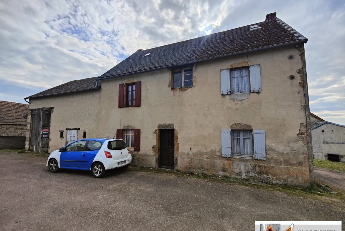 Maison à rénover dans le bourg de Le Quartier – 2 chambres, garage et grange 