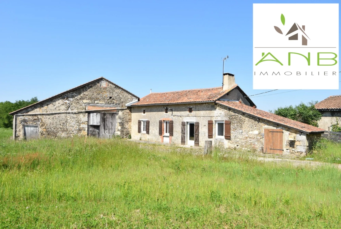 Maison en pierre avec grange et terrain à Bussière-Badil 