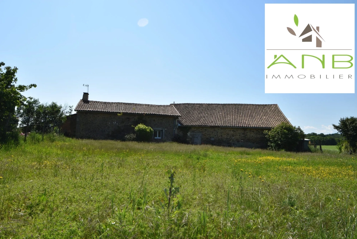 Maison en pierre avec grange et terrain à Bussière-Badil 